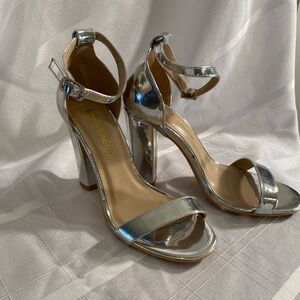 Chrome Heels Charm Ankle Strap Heels. Size 6.5M. Worn once or twice.